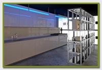 industrial sized kitchen with blue lighting